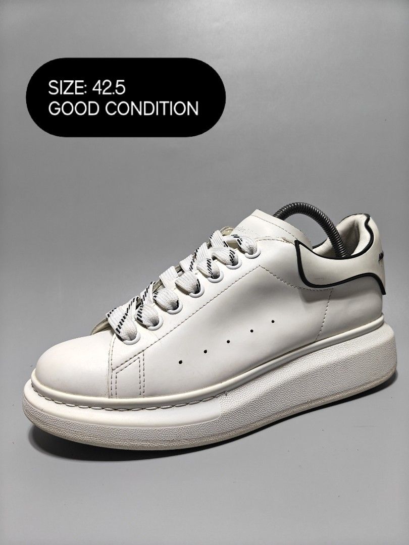 Alexander McQueen Oversized Sneaker (Category: Sneakers) located in Manila. Submitted by baguiogirlyy (Listing ID 1465096046, Image 2). Description: - Color: Classic white with black heel counters - Style: Trendy chunky platform silhouette with wide laces - Condition: Clean uppers, very minimal wear on the tread - Versatility: Great everyday kicks that match any outfit - Shipping: Fast shipping or meet-ups available - Note: Feel free to send a me