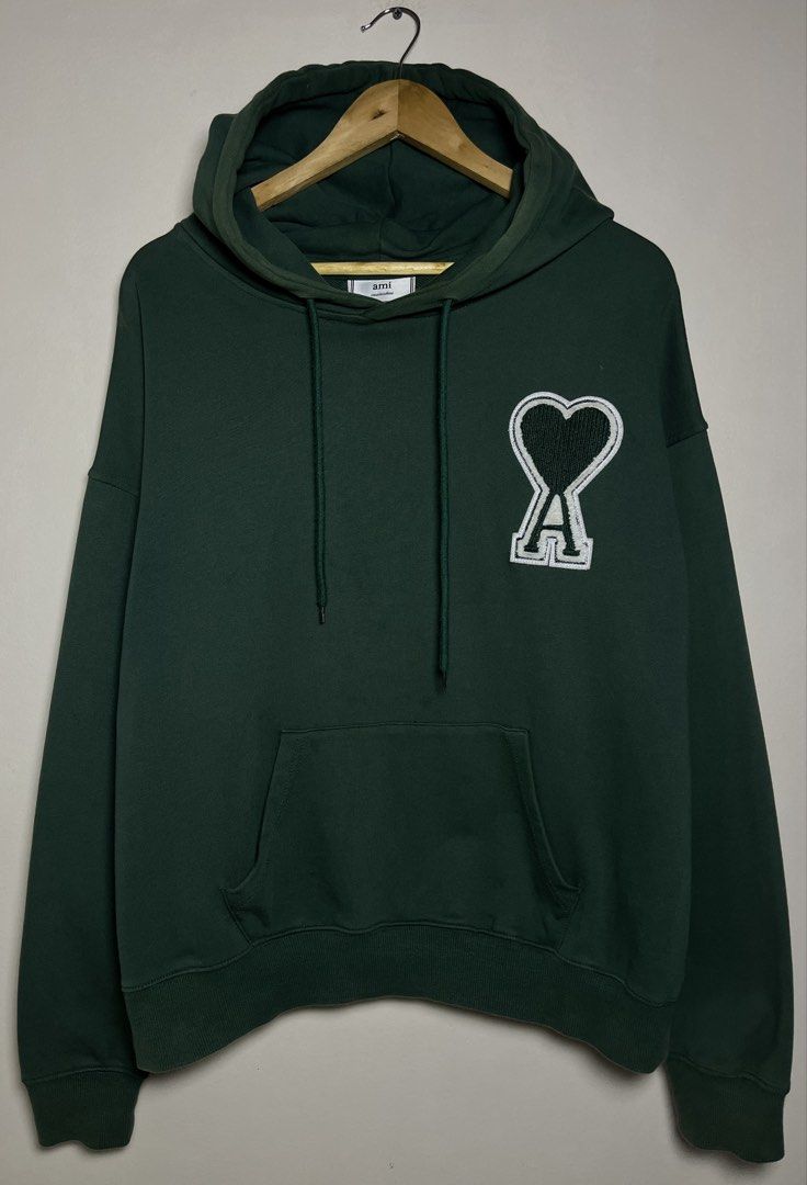ami patch heart logo green (Category: Hoodies) located in Marikina City. Submitted by chasecollectives (Listing ID 1465111191, Image 1). Description: AMI HEART PATCH HOODIE VGOOD CONDITION SIZE LARGE OVERSIZE WIDTH : 25 LENGTH : 26 FADE NECK.