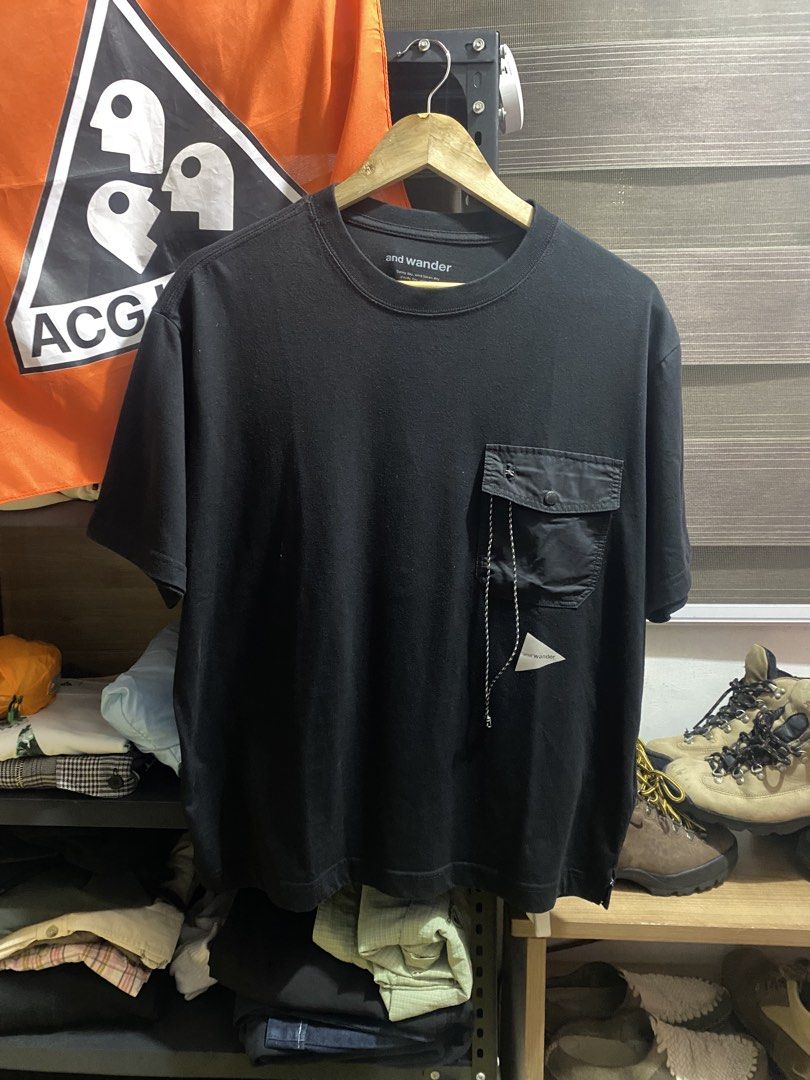 And wander (Category: Tshirts & Polo Shirts ) located in Calamba. Submitted by sonworld_ (Listing ID 1465090404, Image 1). Description: And wander pocket tee (black) 22.5 x 26.5 | Medium Excellent condition 🏷️ 1,500.