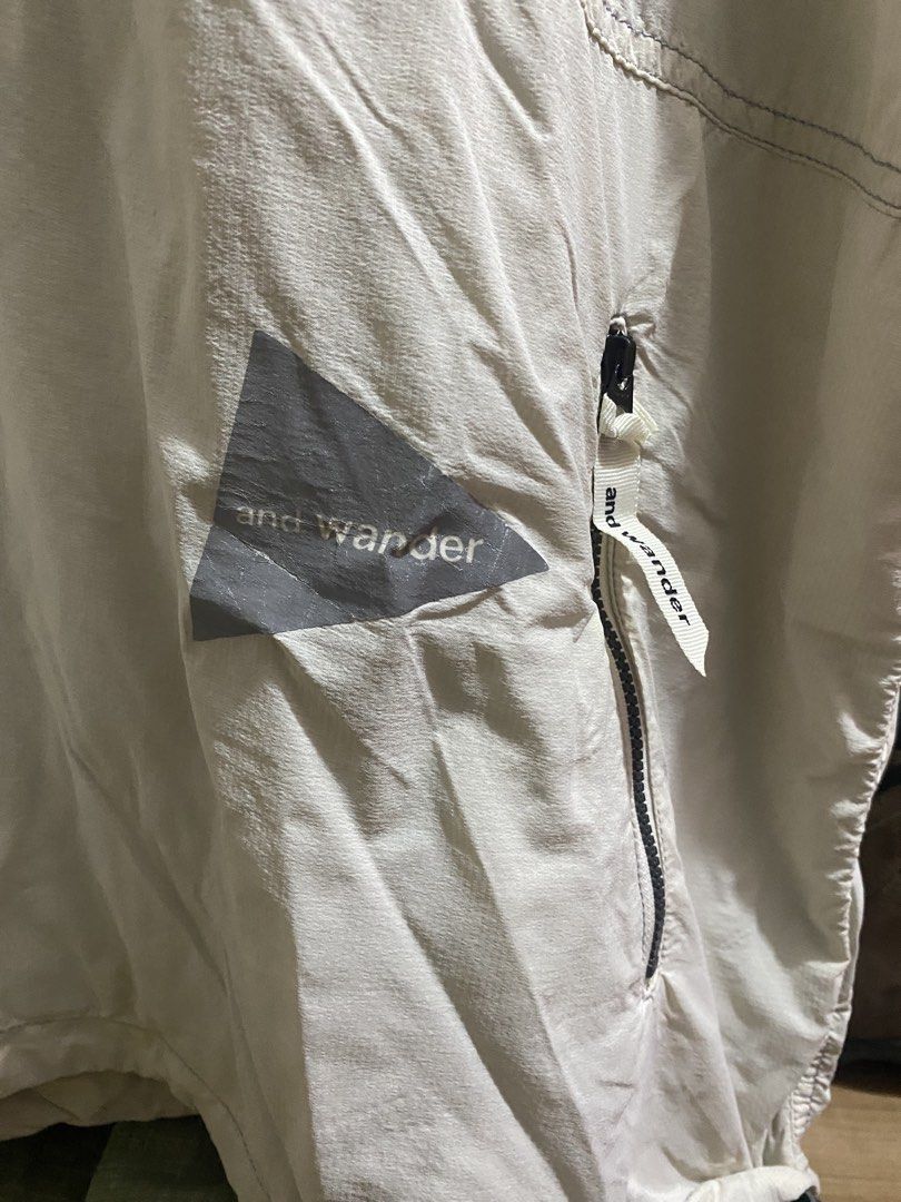 And wander pertex wind tshirt (Category: Coats, Jackets and Outerwear) located in Calamba. Submitted by sonworld_ (Listing ID 1465090832, Image 2). Description: And wander pertex wind tshirt (off white) 23 x 26 | Medium - adjustable Excellent condition Minimal damage on logo 🏷️1,500.