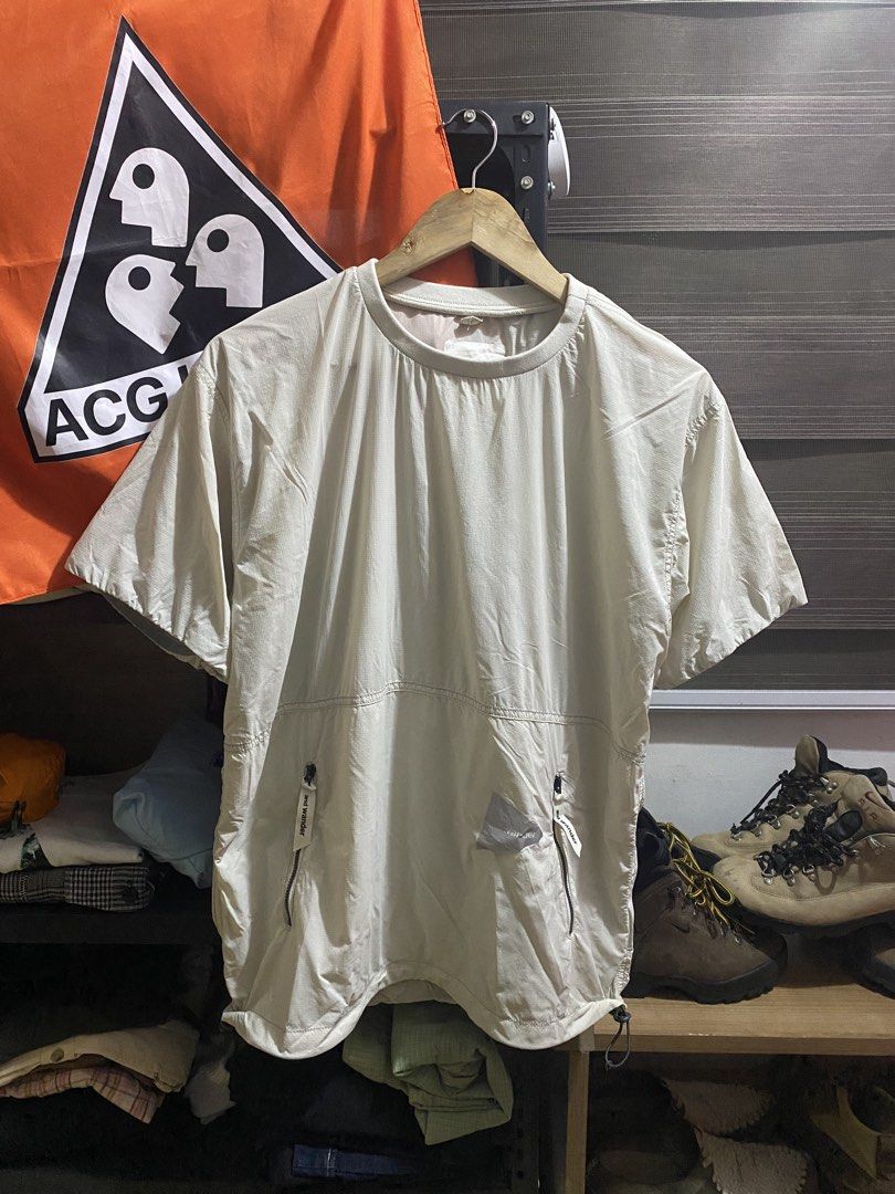 And wander pertex wind tshirt (Category: Coats, Jackets and Outerwear) located in Calamba. Submitted by sonworld_ (Listing ID 1465090832, Image 1). Description: And wander pertex wind tshirt (off white) 23 x 26 | Medium - adjustable Excellent condition Minimal damage on logo 🏷️1,500.