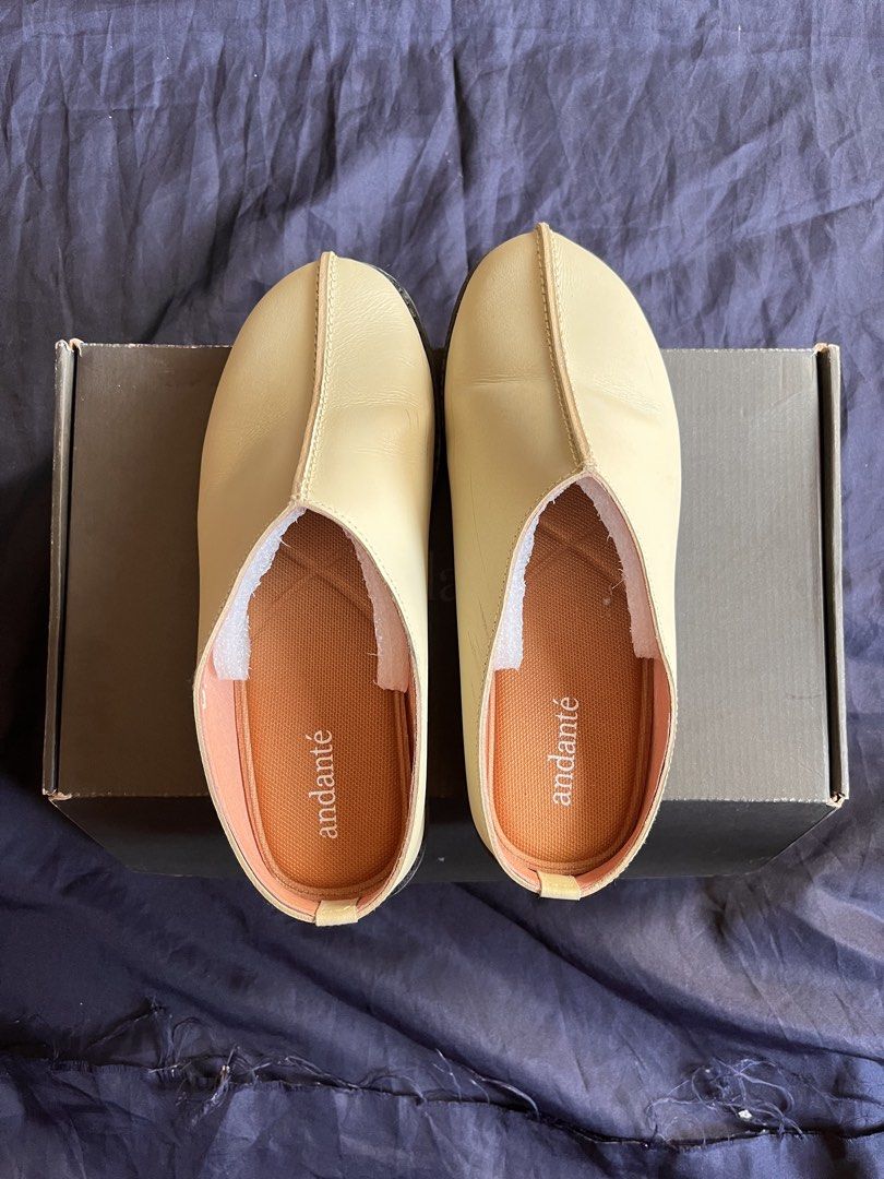 Andante Clog Mule - Cream (Category: Flats & Sandals) located in Antipolo. Submitted by betterera_ (Listing ID 1465039724, Image 3). Description: A slip-on mule with a structured silhouette and a chunky, rubber outsole. Has a distinct center seam running from the vamp to tip. Product Details • 100% lambskin leather upper • Leather lining • Aerifoam soft insole • Lightweight platform outsole • Handmade by fair trade Handmade from 100% full grain l