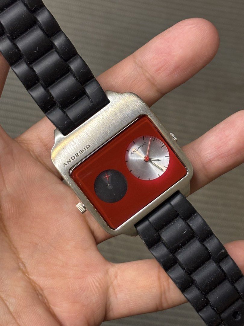 Android USA Space Age Dual-Time (Category: Men's Watches) located in Manila. Submitted by soughtafterseconds (Listing ID 1465136807, Image 2). Description: Android USA Space Age Dual-Time This Android USA Space Age Dual-Time Square Watch is a fantastic piece of early-2000s retro-futuristic JDM/US boutique horology. Built with asymmetric “sci-fi” geometry and a crimson-tinted crystal face, it looks straight out of a classic cyberpunk film set. It 