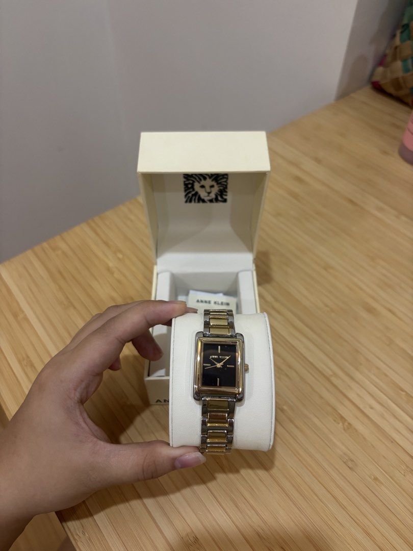 Anne Klein Two-Tone Black Dial Watch (Category: Women's Watches) located in Muntinlupa City. Submitted by sofiaannf (Listing ID 1465106307, Image 2). Description: - Anne Klein Two-Tone Black Dial Watch - Condition: Clean glass and polished metal finish - Inclusion: Comes with original branded box - price is negotibale - rfs: need funds 🙏🏻🙏🏻🙏🏻 .