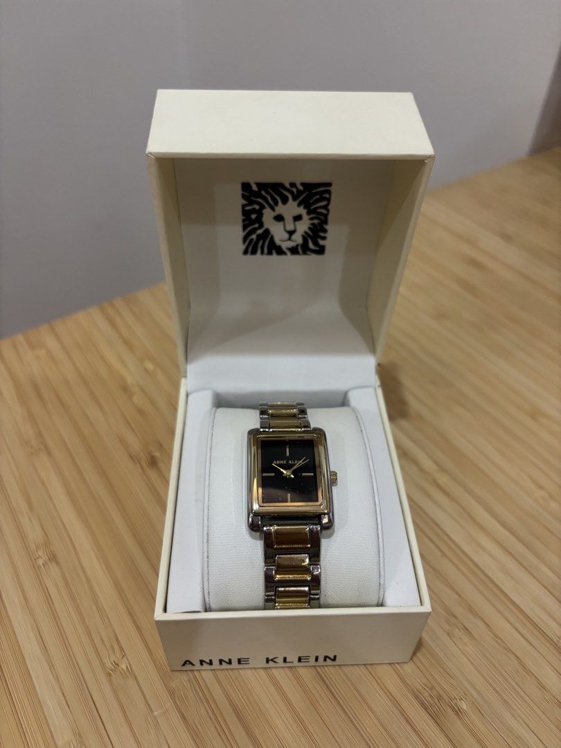 Anne Klein Two-Tone Black Dial Watch (Category: Women's Watches) located in Muntinlupa City. Submitted by sofiaannf (Listing ID 1465106307, Image 1). Description: - Anne Klein Two-Tone Black Dial Watch - Condition: Clean glass and polished metal finish - Inclusion: Comes with original branded box - price is negotibale - rfs: need funds 🙏🏻🙏🏻🙏🏻 .