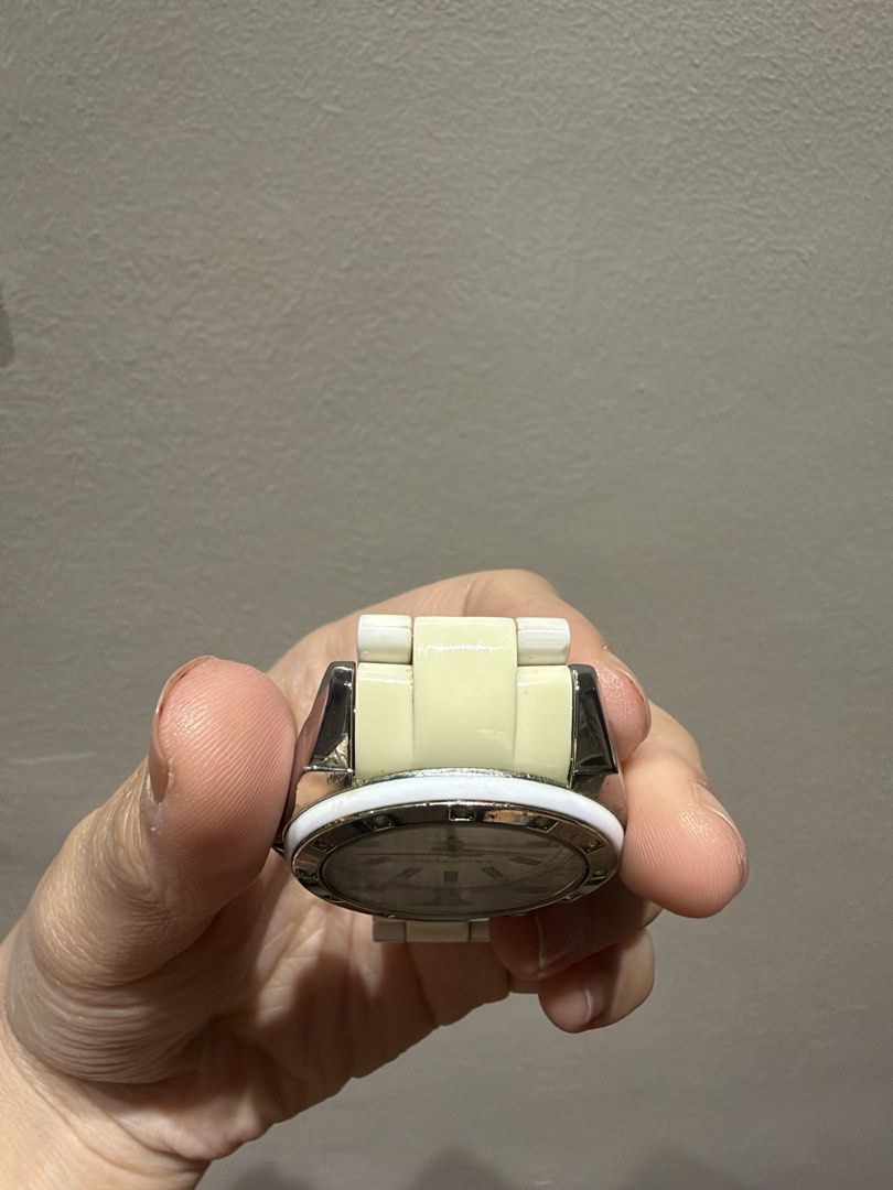 Anne Klein White Ceramic Watch (Category: Women's Watches) located in Marikina City. Submitted by lemonlover2 (Listing ID 1465062708, Image 3). Description: Original Anne Klein Comes as is (fits small wrists) no more extra links or box Good working condition. Already has new battery in With discoloration as seen in the photos Bought for 5k and selling low Marikina City Can SSD or J&T .