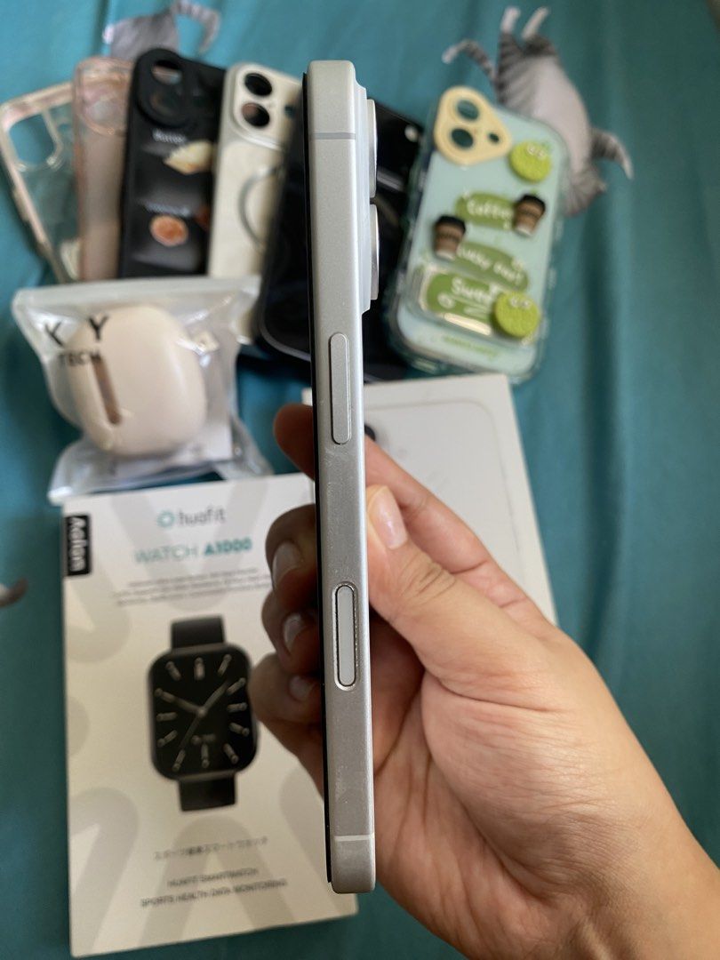 Apple iPhone 16 White with Original Box and Cases (Category: iPhone 16 Series) located in Iloilo. Submitted by angelenepe01084 (Listing ID 1465097713, Image 3). Description: - Model: Apple iPhone 16 (White) - Condition: Clean screen, excellent working condition - Inclusions: Original retail box, several protective cases, packaged earbuds, and an extra smartwatch - Note: All items pictured are included as a complete bundle - Reason for selling: Up