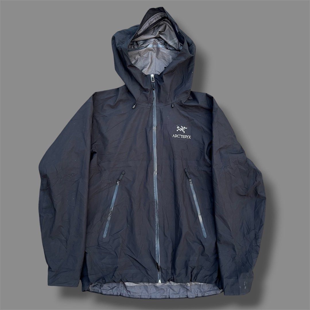Arc'teryx GORE-TEX Windproof Breathable Hooded Jacket Black (Category: Announcements) located in Paranaque City. Submitted by commonfind.ph (Listing ID 1465015459, Image 2). Description: - Brand: Arc'teryx -Size large 22x27 - Color: Classic Black - Material: Premium Gore-Tex fabric (waterproof, windproof, and breathable) - Features: Embroidered chest logo, waterproof zippered pockets, and fully adjustable hood with drawcords - Versatility: Ideal 