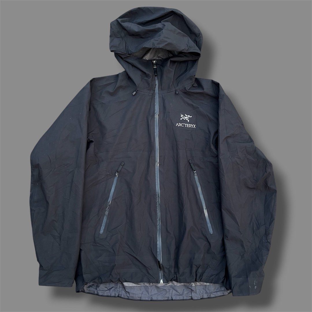 Arc'teryx GORE-TEX Windproof Breathable Hooded Jacket Black (Category: Announcements) located in Paranaque City. Submitted by commonfind.ph (Listing ID 1465015459, Image 3). Description: - Brand: Arc'teryx -Size large 22x27 - Color: Classic Black - Material: Premium Gore-Tex fabric (waterproof, windproof, and breathable) - Features: Embroidered chest logo, waterproof zippered pockets, and fully adjustable hood with drawcords - Versatility: Ideal 