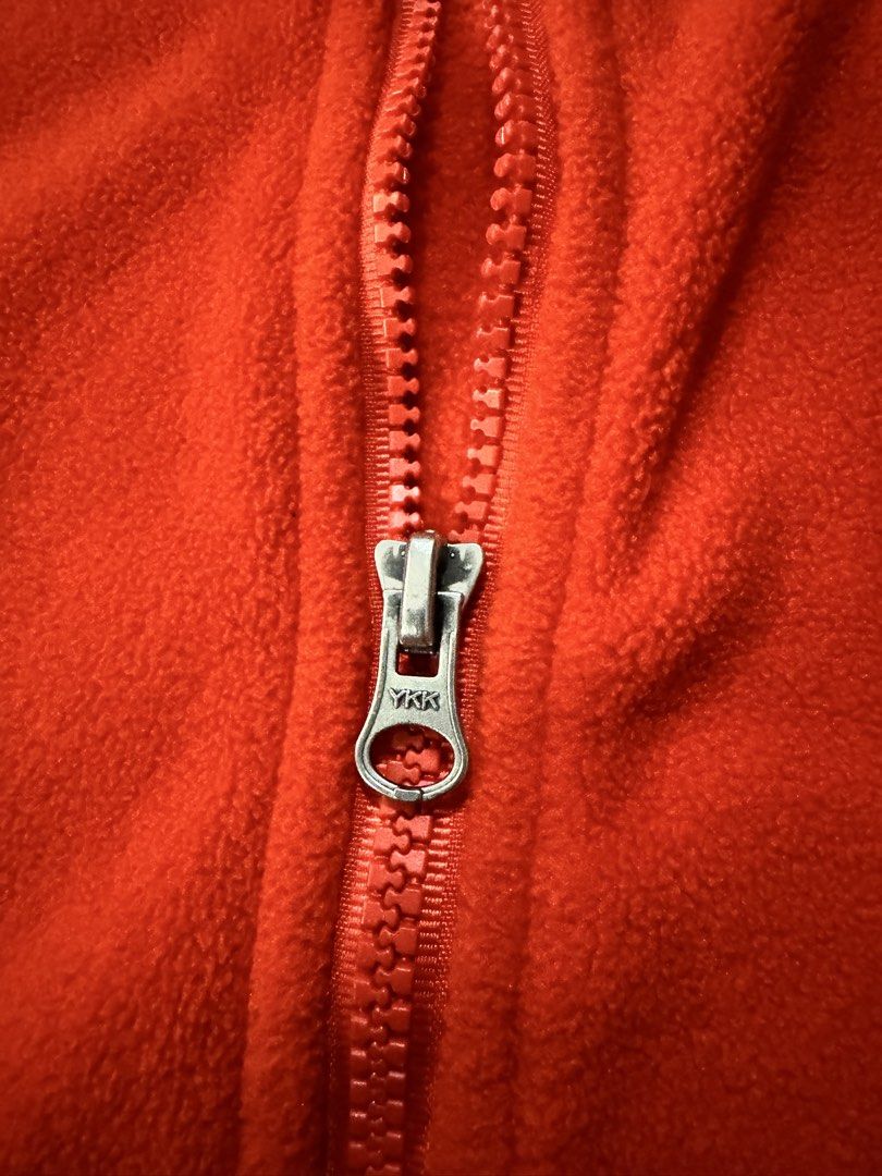 Arc'teryx Orange Fleece Zip Jacket (Category: Coats, Jackets and Outerwear) located in Caloocan City. Submitted by gabbieerfritter (Listing ID 1465140007, Image 3). Description: - Brand: Arc'teryx - Color: Bright orange with contrasting grey collar and cuffs - Hardware: Durable YKK full front zip - Details: Embroidered logo on the chest - Fit & Comfort: Warm, soft fleece material ideal for outdoor activities or casual daily wear.