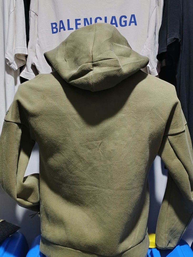 Army Jacket (Category: Coats, Jackets and Outerwear) located in Bulacan. Submitted by ukaybrandedshop (Listing ID 1465020029, Image 2). Description: Adidas Full Zip Hoodie - Olive Green Size: M-L | Dimes: W22 L26 (paki-edit) Condition 9/10 makapal, no fade, good zipper Issue: may maliit na tuldok / pin hole sa sleeve - maliit lang, di halata pag suot (see pic) ₱750 / J&T / Lalamove PM lang.
