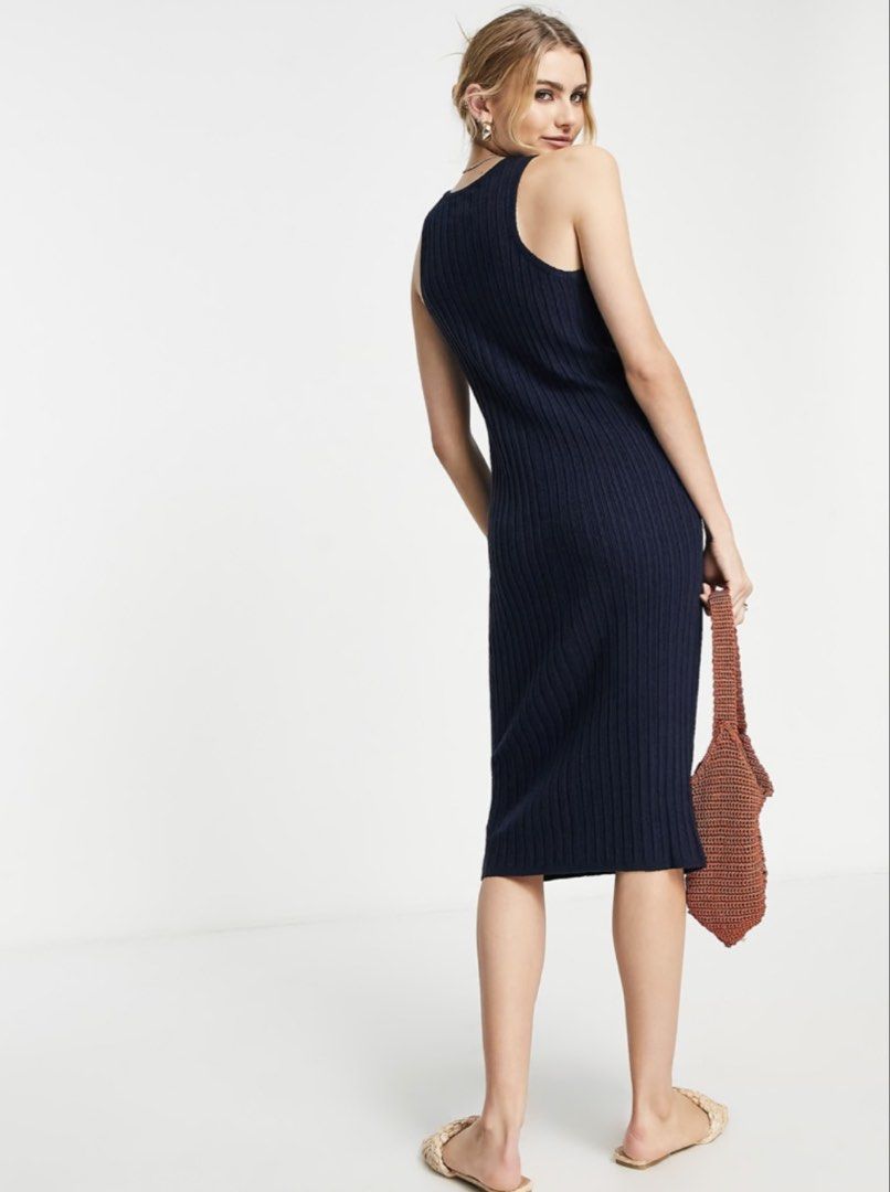 ASOS DESIGN knitted midi dress (Category: Dresses) located in Paranaque City. Submitted by famsale2016 (Listing ID 1465057840, Image 2). Description: Likenew to Bnew condition ✨ Size M on tag but can fit L - The textured navy ribbed knit of this ASOS DESIGN knitted midi dress. - The fabric is quite thick so undergarments don’t show through, yet it is stretchy and soft..