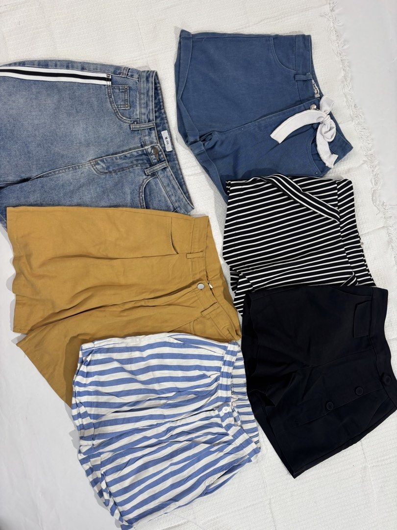 Assorted Denim and Casual Shorts Skirts Overalls Bundle (Category: Sets or Coordinates) located in Manila. Submitted by leilarazo (Listing ID 1465049868, Image 2). Description: - Wardrobe clearance bundle featuring casual denim skirts, shorts, overalls, and pants - Variety of washes, colors, and styles including blue denim, black, and striped pieces - Features multiple waist styles such as belted, buttoned, and zipped - Sizes and cuts vary across