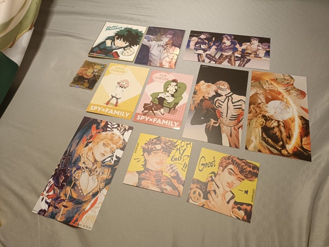 Assorted freebies (Category: Character Goods) located in Singapore. Submitted by piltoverjinx (Listing ID 1465079055, Image 1). Description: Details: - Izuku Midoriya / Deku Shikishi: See 3rd & 4th picture for condition! - Rest: Not used before! - Only deku shikishi, Anya and Yor Forger postcards, & Zenitsu translucent photocard is official. The rest are made from amuiiart/jyill__ on ig! RFS: Accidentally duplicated them because of a mistake in p