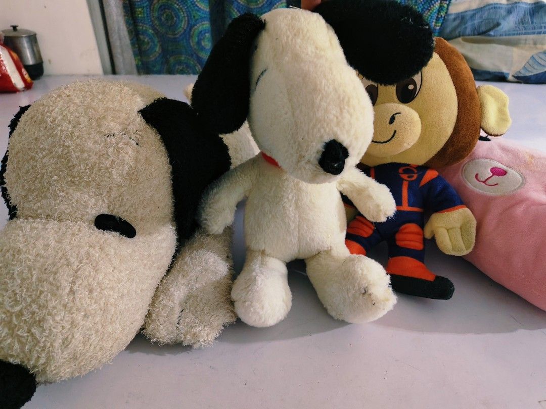 Assorted Stuffed Plush Toys Lot Snoopy and Monkey (Category: Plushies & Soft Toys) located in Bulacan. Submitted by babz30261 (Listing ID 1465119175, Image 3). Description: - Set of soft plush toys including 2 Snoopy dogs, a space monkey, and a pink pillow - Made with soft, huggable fabric - Ideal for kids, collectors, or room decor - Selling as a whole set.