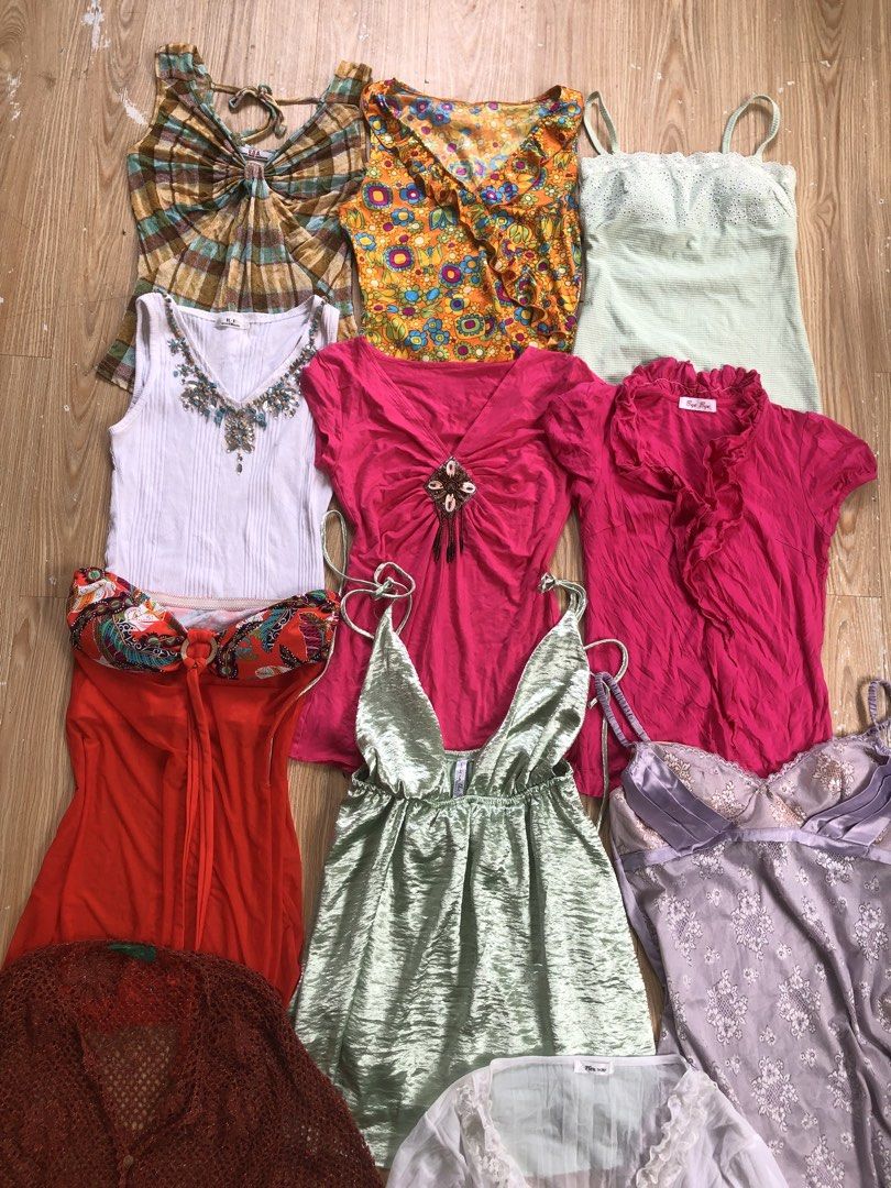 Assorted Y2K boho camis, tops and cardigans bundle (Category: Blouses) located in Manila. Submitted by tunicy2k (Listing ID 1465022893, Image 2). Description: - Bundle of 10 different tops and camisoles - Includes plaid halter, floral blouse, pastel green cami, beaded white tank, pink ruffled shirts, orange halter, metallic green swing cami, floral satin slip dress, brown crochet cardigan, and white sheer lace-trim top - Mix of bohemian and Y2K a