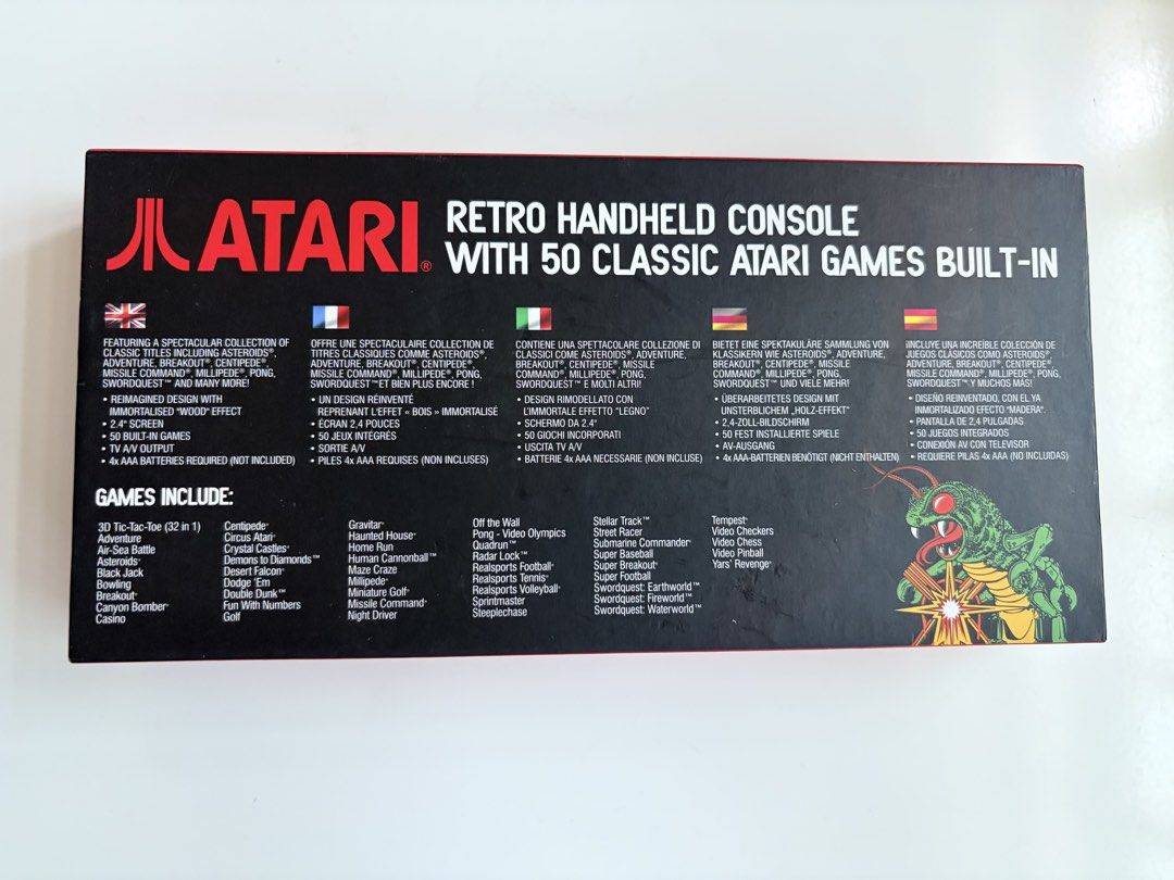 Atari Retro Handheld Console with 50 Classic Games by Blaze (Category: Others) located in Santa Rosa. Submitted by serf60762 (Listing ID 1465015377, Image 2). Description: Selling Atari Retro Handheld Console by Blaze for PhP 3.5K - Stylish wood-grain finish - 50 built-in classic games including Asteroids, Pong, and Centipede - Clear 2.4-inch screen with TV A/V output port - Clean condition, fully tested, and working properly - Powered by 4 AAA b