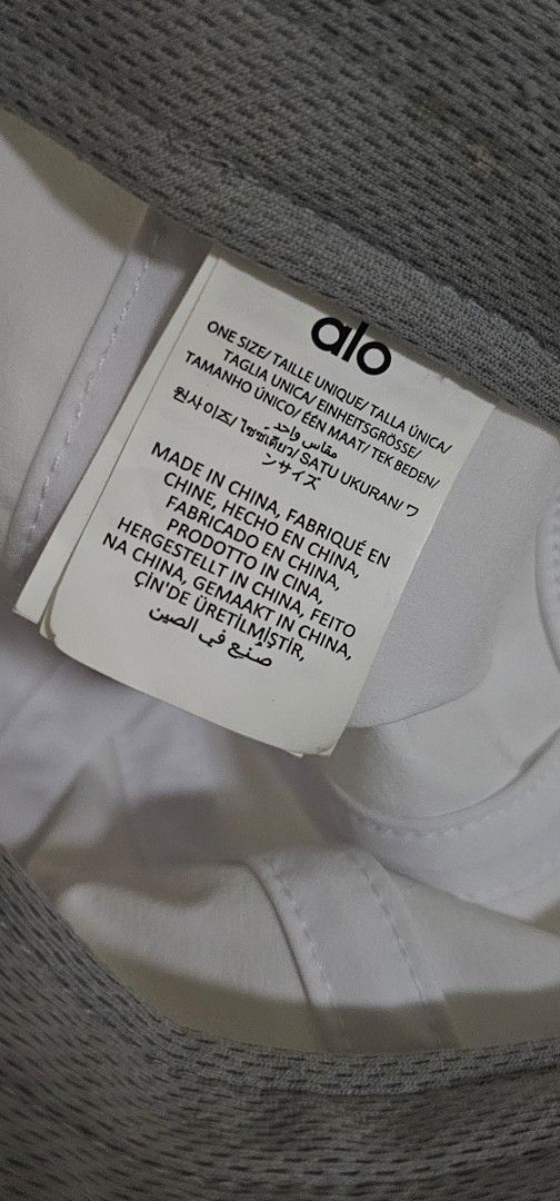 Authenric Alo Yoga White Cap (Category: Caps & Hats) located in Davao. Submitted by sachigo (Listing ID 1465078872, Image 3). Description: - Brand: Alo Yoga - Color: Clean White - Design: Classic raised logo on front - Fit: One size fits most (adjustable strap) - Condition: Brand new with internal tags - Origin: Made in China - Ideal for: Gym workouts, running errands, or casual streetwear - PM for quick transactions and shipping!.