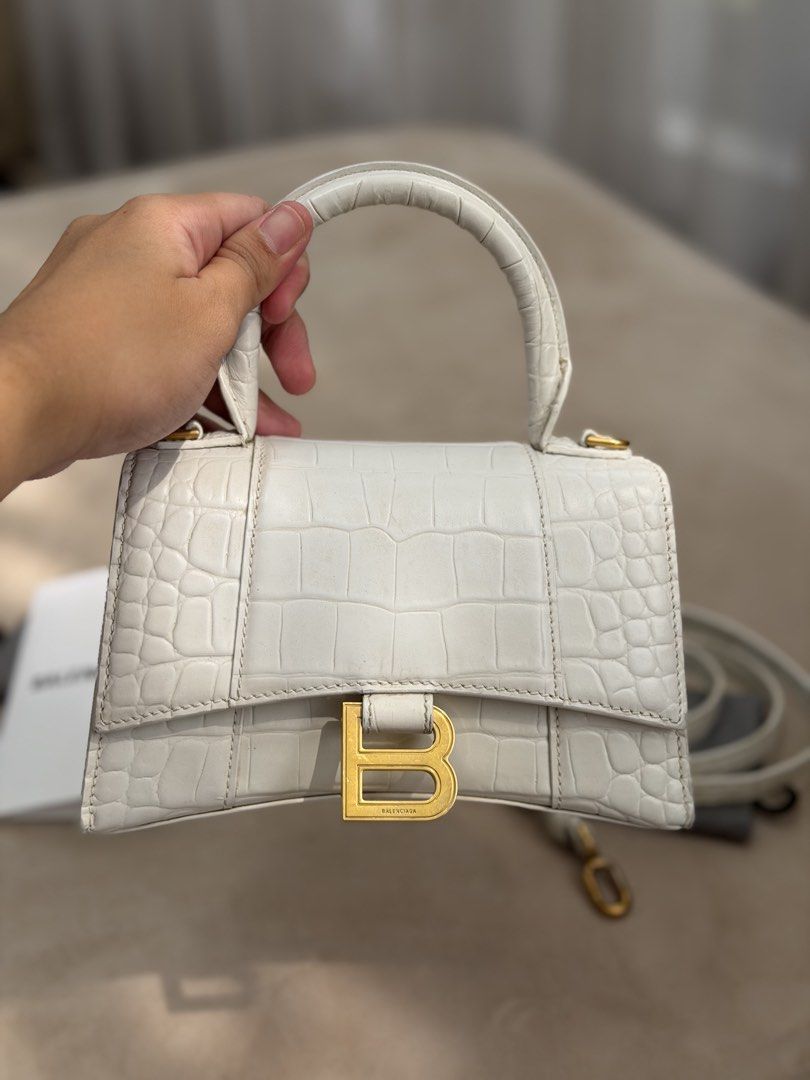 Authentic Balenciaga Croc Embossed Mini Hourglass Top Handle (Category: Cross-body Bags) located in Manila. Submitted by maria_2326 (Listing ID 1465016626, Image 2). Description: Balenciaga Croc Embossed Hourglass Top Handle Mini | promax CANNOT fit 💯% Authentic W/ dust bag, long strap, and store receipt Location: Manila/QC.