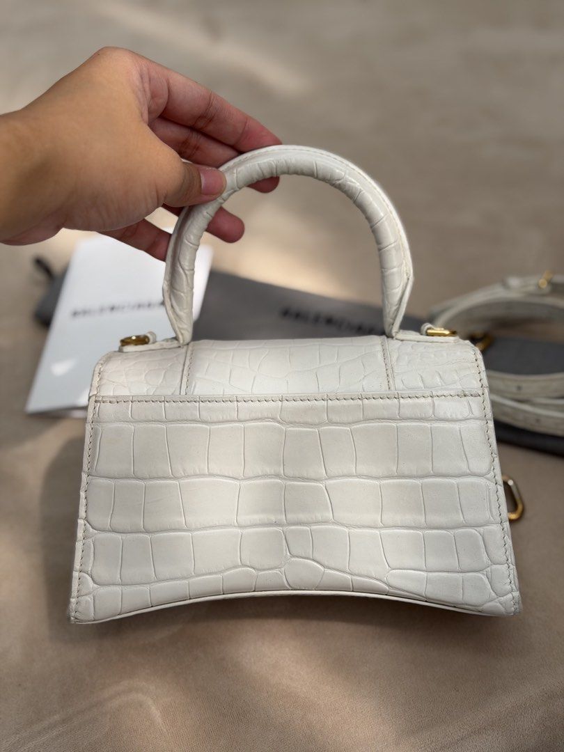 Authentic Balenciaga Croc Embossed Mini Hourglass Top Handle (Category: Cross-body Bags) located in Manila. Submitted by maria_2326 (Listing ID 1465016626, Image 3). Description: Balenciaga Croc Embossed Hourglass Top Handle Mini | promax CANNOT fit 💯% Authentic W/ dust bag, long strap, and store receipt Location: Manila/QC.