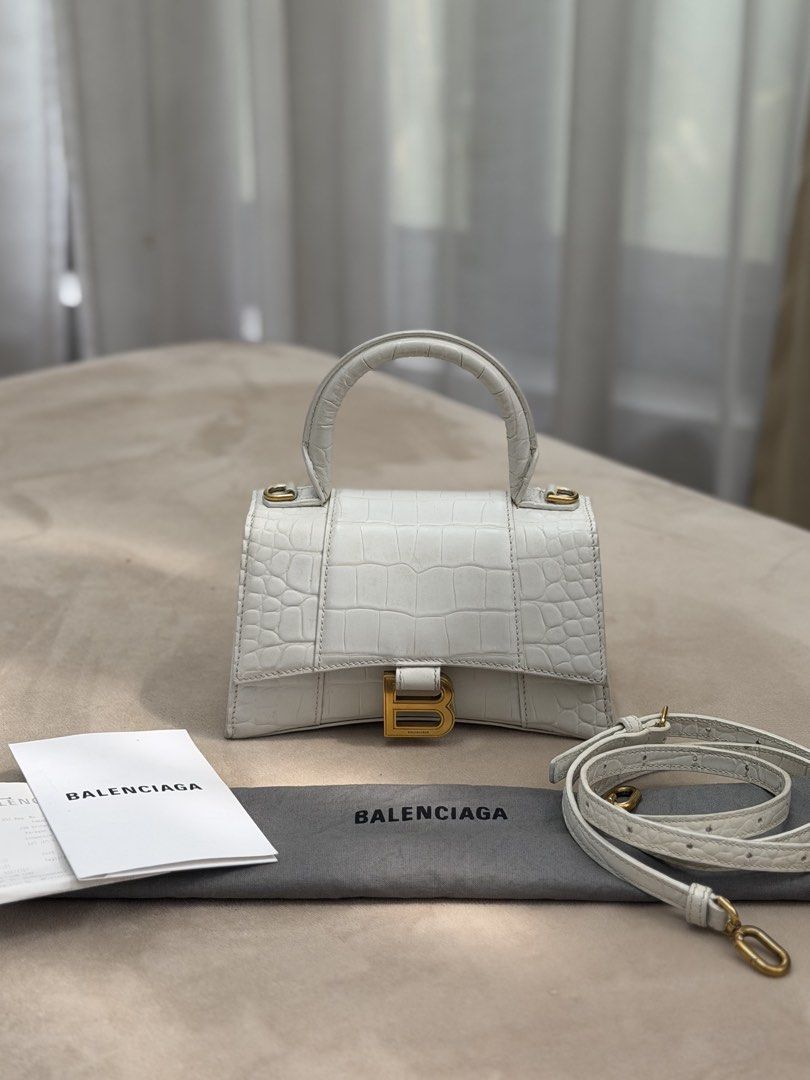 Authentic Balenciaga Croc Embossed Mini Hourglass Top Handle (Category: Cross-body Bags) located in Manila. Submitted by maria_2326 (Listing ID 1465016626, Image 1). Description: Balenciaga Croc Embossed Hourglass Top Handle Mini | promax CANNOT fit 💯% Authentic W/ dust bag, long strap, and store receipt Location: Manila/QC.