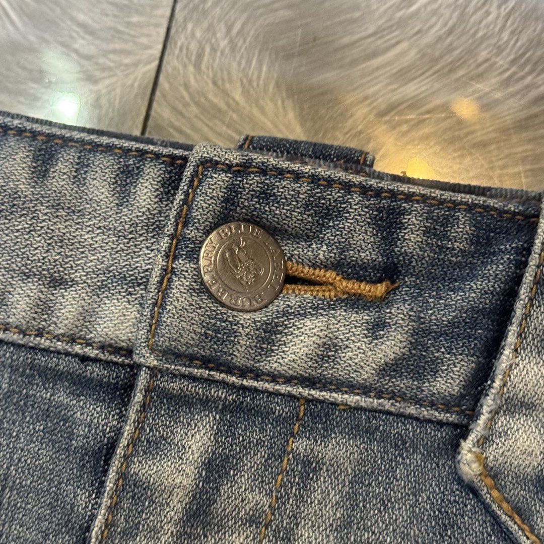 Authentic Burberry Blue Label Denim Buttoned Side Slit Tight Skirt (Category: Skirts) located in Baguio. Submitted by paatttyyyy (Listing ID 1465058687, Image 2). Description: Authentic Burberry Blue Label Denim Buttoned Side Slit Tight Skirt Size 38 .
