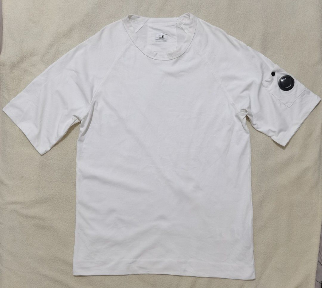 Authentic C.P. Company White Raglan Sleeve Goggle Tee (Category: Tshirts & Polo Shirts ) located in Santa Cruz. Submitted by oddpenguin-4575 (Listing ID 1465113513, Image 2). Description: 📌.....P L E A S E R E A D..... 📌measurement:Laid flat Sh-__"/Sleeve-17.5"/Chest-21"/Lenght-30"/armhole-7"/armpit-__" 📌size:Filipino Men's Size Large (L) to Extra Large (XL), leaning closer to a slim-fit XL or regular-fit Large 📌color-9/10 📌 Brand: Sandro Pa