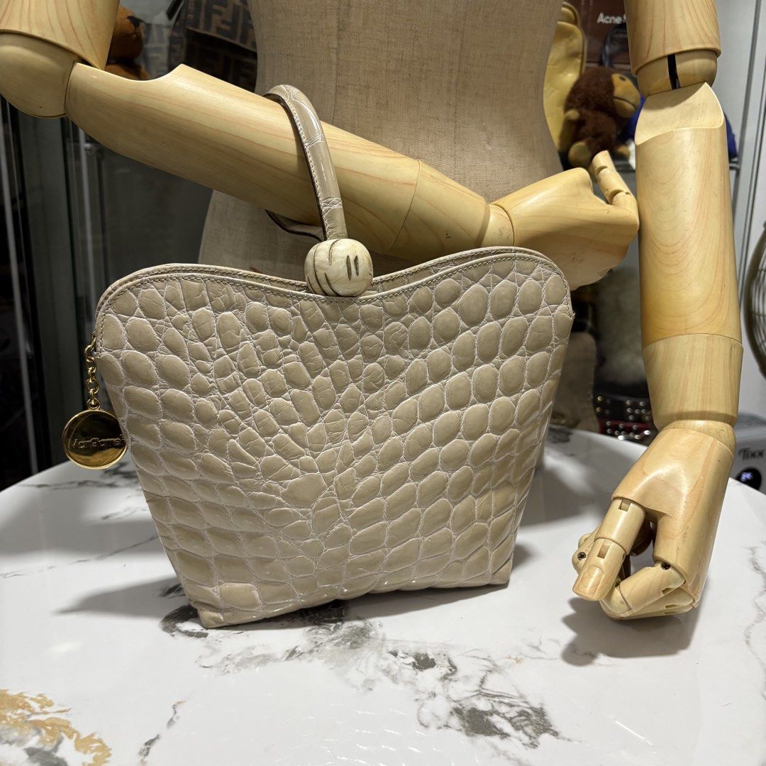 Authentic Egal by Mangiameli Genuine Crocodile Hand bag (Category: Purses & Pouches) located in Binangonan. Submitted by makoleksyon (Listing ID 1465017443, Image 1). Description: Excellent condition Like new No flaws Rare Size: H-7 x W-9.5 x D-2 inches Made in Italy Real crocodile leather Opti zipper Bought in Japan 💯% Authentic Money back guarantee Bought in Japan 💯% Authentic Money back guarantee .