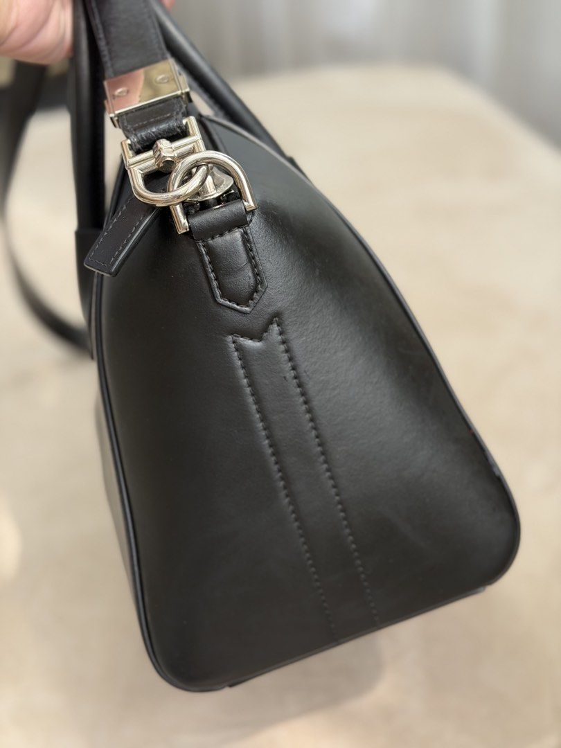 Authentic Givenchy Antigona Black in Small Size (Category: Shoulder Bags) located in Manila. Submitted by maria_2326 (Listing ID 1465115633, Image 3). Description: Givenchy Antigona Small Handbag 💯% Authentic W/ strap, booklet, hangtag, leather swatch Honest flaw: recently underwent bag spa for color enhancement. No lowballing! Location: Manila/QC.