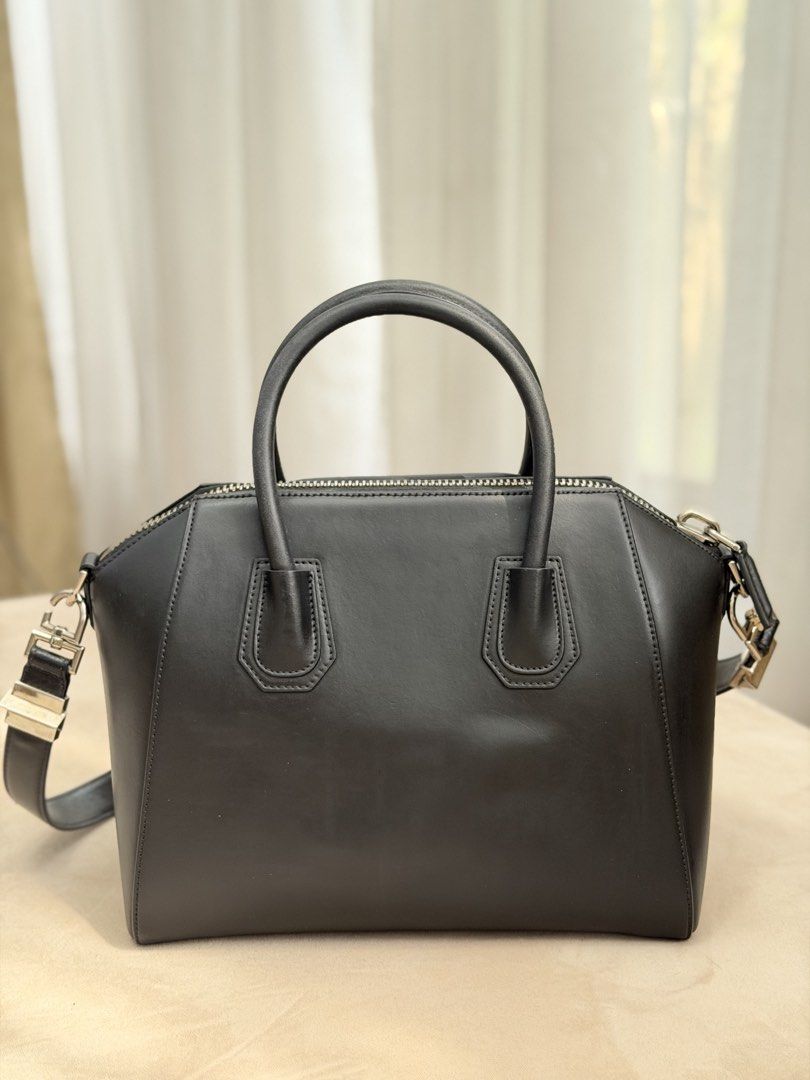 Authentic Givenchy Antigona Black in Small Size (Category: Shoulder Bags) located in Manila. Submitted by maria_2326 (Listing ID 1465115633, Image 2). Description: Givenchy Antigona Small Handbag 💯% Authentic W/ strap, booklet, hangtag, leather swatch Honest flaw: recently underwent bag spa for color enhancement. No lowballing! Location: Manila/QC.