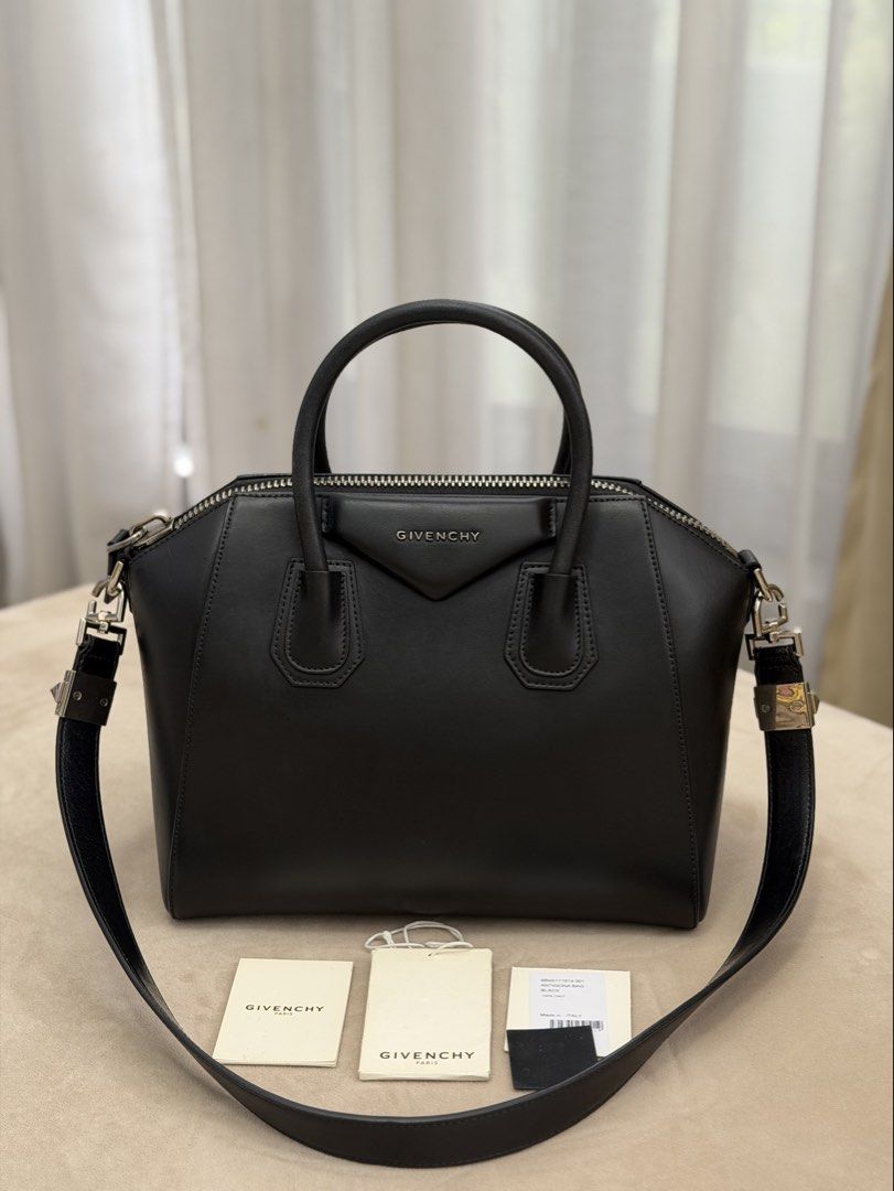 Authentic Givenchy Antigona Black in Small Size (Category: Shoulder Bags) located in Manila. Submitted by maria_2326 (Listing ID 1465115633, Image 1). Description: Givenchy Antigona Small Handbag 💯% Authentic W/ strap, booklet, hangtag, leather swatch Honest flaw: recently underwent bag spa for color enhancement. No lowballing! Location: Manila/QC.