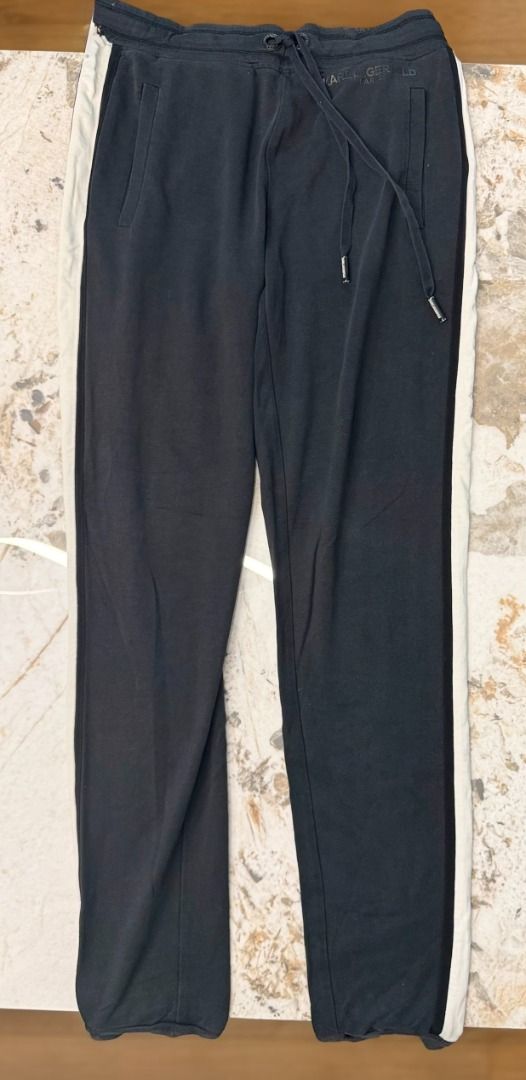 AUTHENTIC KARL LAGERFELD PARIS SIDE-STRIPE TRACK PANTS (Category: Joggers) located in Makati City. Submitted by fpled (Listing ID 1464734097, Image 3). Description: ✨KARL LAGERFELD PARIS SIDE-STRIPE TRACK PANTS ✨ • Size Women’s XS (Fits 25”–28” waist) • Designer • Bought in Europe A straight-leg track pants feature contrasting off-white side stripes, elegant front pin-tuck seams, custom branded metal hardware, and a subtle tonal logo. 📌 PRODUCT 