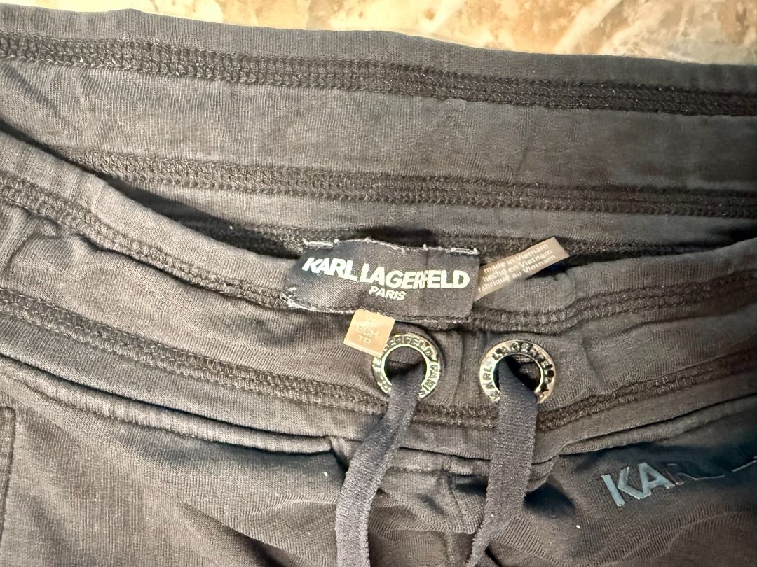 AUTHENTIC KARL LAGERFELD PARIS SIDE-STRIPE TRACK PANTS (Category: Joggers) located in Makati City. Submitted by fpled (Listing ID 1464734097, Image 2). Description: ✨KARL LAGERFELD PARIS SIDE-STRIPE TRACK PANTS ✨ • Size Women’s XS (Fits 25”–28” waist) • Designer • Bought in Europe A straight-leg track pants feature contrasting off-white side stripes, elegant front pin-tuck seams, custom branded metal hardware, and a subtle tonal logo. 📌 PRODUCT 
