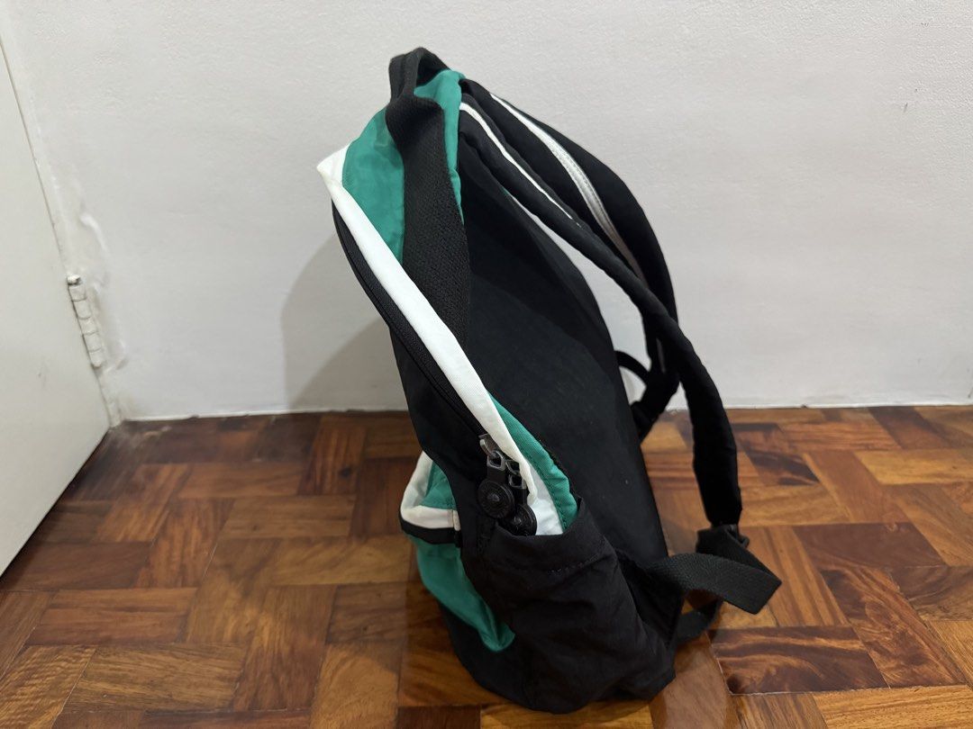 Authentic Kipling Black and Green Backpack (Category: Backpacks) located in Paranaque City. Submitted by monduffcloset (Listing ID 1465092481, Image 3). Description: •Authentic Kipling School Bag • includes small water jug holder • Main compartment with secure double zipper closure and interior slip pocket •Adjustable shoulder straps and a top grab handle •rfs: Decluttering .