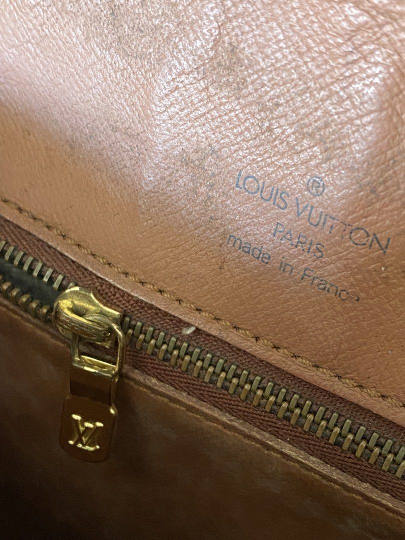 Authentic Louis Vuitton Saint Cloud MM Crossbody Bag (Category: Luxury Bags & Wallets) located in Manila. Submitted by why_notph (Listing ID 1465102902, Image 3). Description: - Authentic Louis Vuitton shoulder bag - Iconic monogram canvas with vachetta leather trim - Secure flap closure with stylish ring accent - Adjustable shoulder strap with comfortable shoulder pad - Normal issue on the strap parts since this was release on the 90s - Brown le