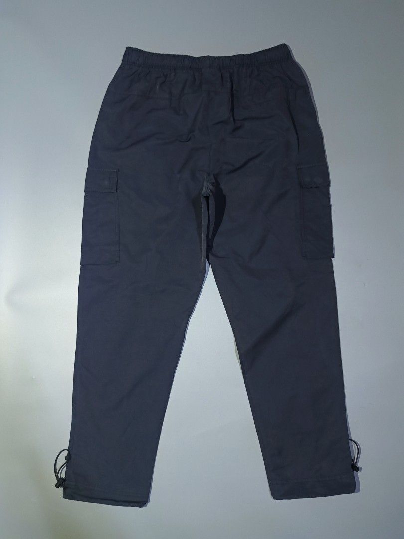 AUTHENTIC NIKE CARGO WOVEN PANTS (Category: Trousers) located in Cebu City. Submitted by kramarklegitseller_2022 (Listing ID 1465110024, Image 3). Description: NIKE CARGO WOVEN PANTS ‼️DARK GREY COLOR‼️ LARGE ON TAG SIZE "30-"34 LENGTH "39 LEGOP "13 HEM "7 AS NEW CONDITION 10/10 COLORATE NO ISSUES NEED WASH 1,250 + SF CEBU LOCATION 📍 CAN SHIP NATIONWIDE 🚢🛫.