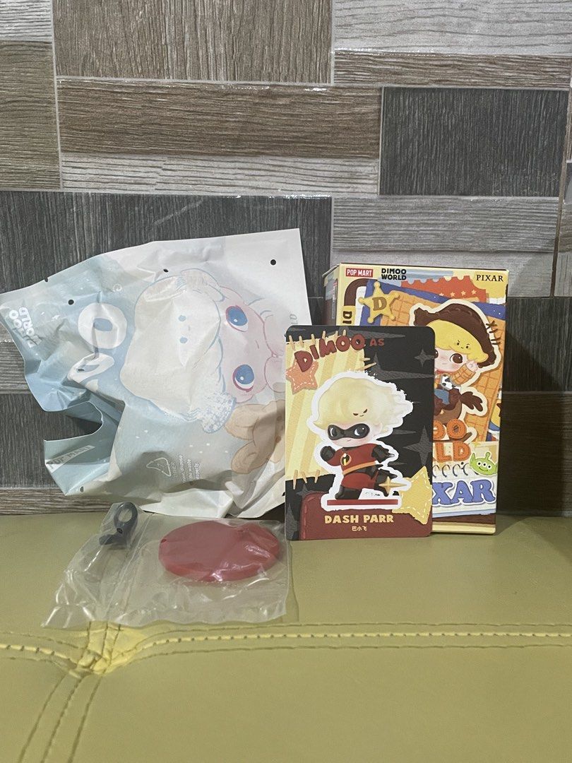 Authentic Popmart Dimoo x Pixar Figure (Category: Designer & Blind Box Toys) located in Manila. Submitted by prelovedpicksph (Listing ID 1465112876, Image 1). Description: — in good condition, no flaws — figure: Dash Parr from Incredibles — only box was opened, packaging is sealed (as shown in pic) — includes: box, card, accessories, figure itself — bought from Popmart in MOA.
