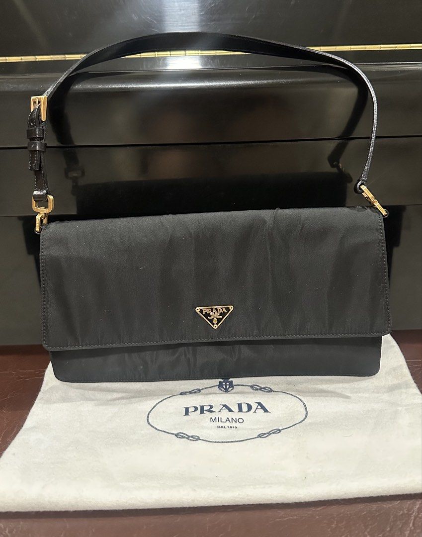 Authentic Prada Black Nylon Shoulder Bag (Category: Luxury Bags & Wallets) located in Las Pinas. Submitted by marshmallowmax (Listing ID 1465060746, Image 1). Description: Guaranteed Orig no flaws with dustbag. L-10 x H-5”.