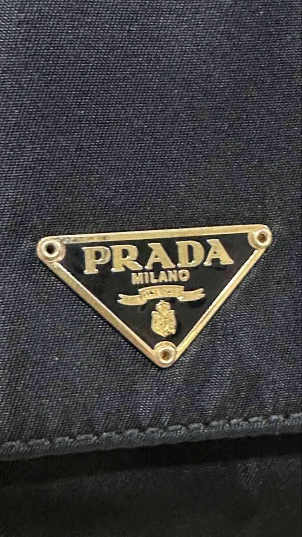 Authentic Prada Black Nylon Shoulder Bag (Category: Luxury Bags & Wallets) located in Las Pinas. Submitted by marshmallowmax (Listing ID 1465060746, Image 2). Description: Guaranteed Orig no flaws with dustbag. L-10 x H-5”.