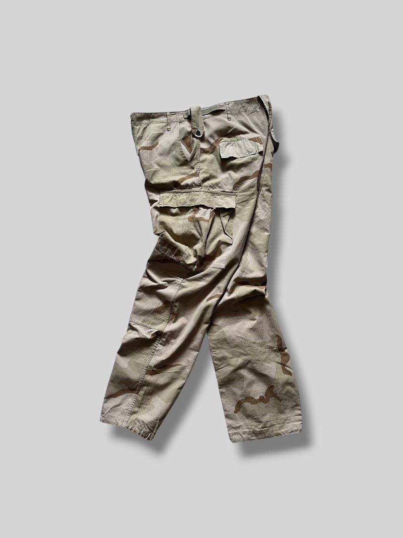 Baggy Brown Camou Pants (Category: Jeans) located in Cebu City. Submitted by dip.thrift (Listing ID 1465115806, Image 3). Description: ▫️Green Tag ▫️Waistline: 32-36 Length: 42 Thigh: 14.5 Leg Opening: 8.5 ▫️Issue: Ripped (Button Area / Unnoticeable) ▫️Color Rate: 10/10 ▫️Condition: 9/10 .