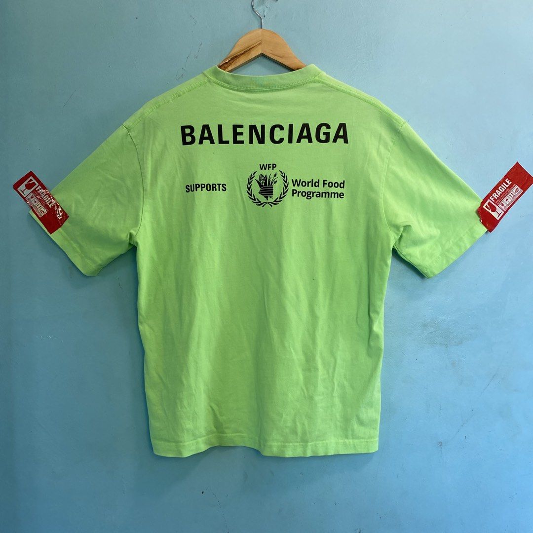 Balenciaga World Food programme shirt (Category: Tshirts & Polo Shirts ) located in Santo Tomas. Submitted by niftynook_22 (Listing ID 1465016111, Image 2). Description: Good condition 9/10 color rate 21x27 Needs wash.