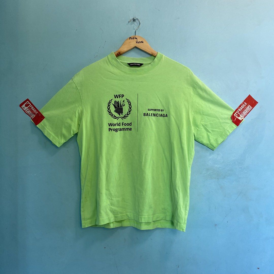 Balenciaga World Food programme shirt (Category: Tshirts & Polo Shirts ) located in Santo Tomas. Submitted by niftynook_22 (Listing ID 1465016111, Image 1). Description: Good condition 9/10 color rate 21x27 Needs wash.