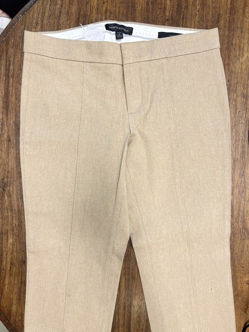 Banana Republic Tailored Ankle Pants (Category: Other Bottoms) located in Antipolo. Submitted by tshopph (Listing ID 1465044589, Image 2). Description: ✨ Classic tailored trousers featuring front pintuck seam detailing for a flattering, elongated silhouette ✨ Flat waistband with clean front closure and sleek, minimalist design. ✨ Rear welt pockets for a polished workwear look. ✨ Perfect for office wear, professional settings, smart-casual events,