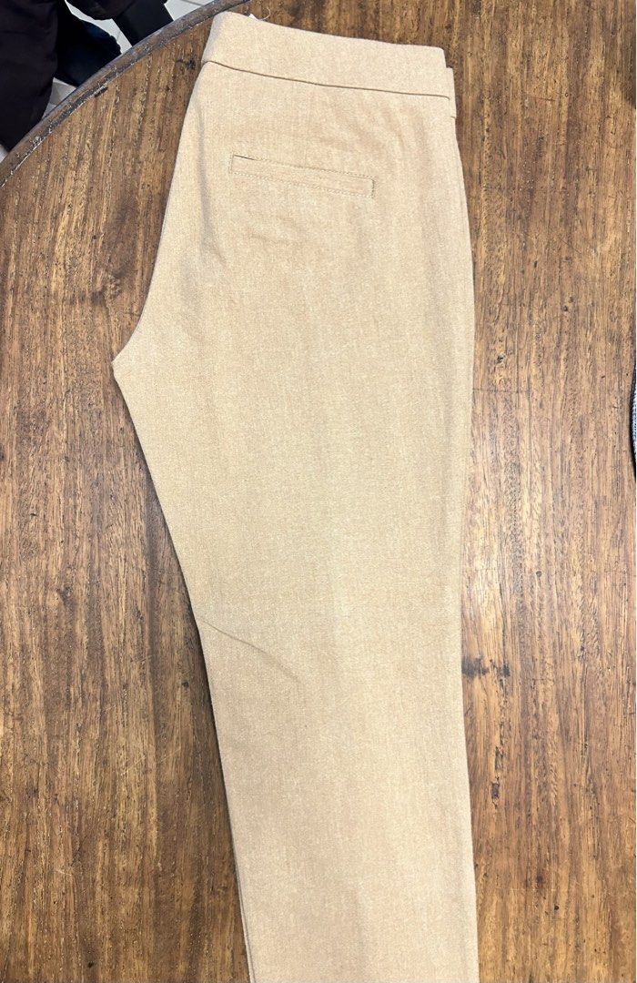Banana Republic Tailored Ankle Pants (Category: Other Bottoms) located in Antipolo. Submitted by tshopph (Listing ID 1465044589, Image 3). Description: ✨ Classic tailored trousers featuring front pintuck seam detailing for a flattering, elongated silhouette ✨ Flat waistband with clean front closure and sleek, minimalist design. ✨ Rear welt pockets for a polished workwear look. ✨ Perfect for office wear, professional settings, smart-casual events,