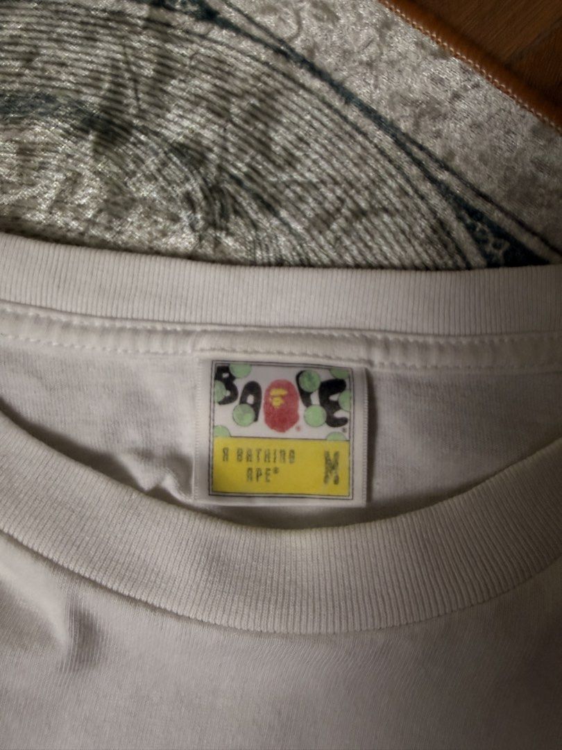 Bathing ape (Category: Luxury Apparel) located in Candelaria. Submitted by ballerthrift796 (Listing ID 1464979266, Image 3). Description: Bathing ape Good condition Isue minimal hairline W- 20 L- 27.