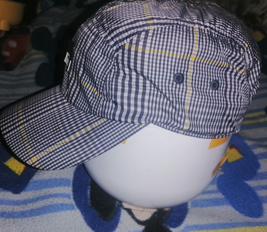 Beanpole Sport Checkered 5-Panel Cap (Category: Caps & Hats) located in Quezon City. Submitted by rolenalma (Listing ID 1465073538, Image 2). Description: - Brand: Beanpole Sport - Design: Blue and white checkered pattern with yellow grid lines - Details: Front rubber logo patch and interior taped seams with printed branding - Fit: Adjustable strap at the back with a branded metal buckle - Size: M - Condition: Great casual hat for everyday wear.