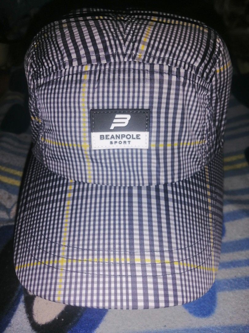 Beanpole Sport Checkered 5-Panel Cap (Category: Caps & Hats) located in Quezon City. Submitted by rolenalma (Listing ID 1465073538, Image 1). Description: - Brand: Beanpole Sport - Design: Blue and white checkered pattern with yellow grid lines - Details: Front rubber logo patch and interior taped seams with printed branding - Fit: Adjustable strap at the back with a branded metal buckle - Size: M - Condition: Great casual hat for everyday wear.