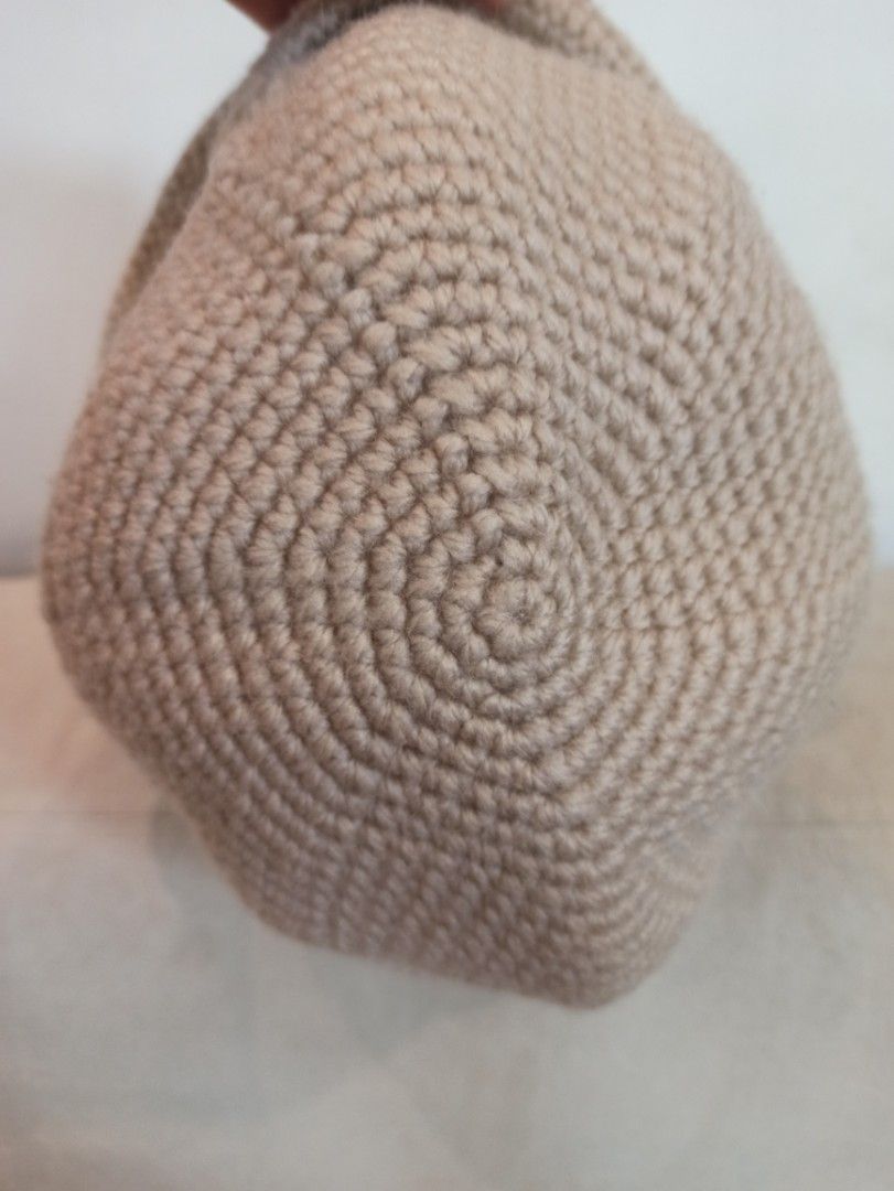 Beige Crochet Bucket Hat Handmade Knit Cap (Category: Hats & Beanies) located in Caloocan City. Submitted by rtarellano (Listing ID 1464992534, Image 3). Description: - Handmade crochet hat in a versatile neutral beige shade - Dense, tight stitch pattern for durability and a neat finish - Structured brim designed to hold its shape well - Made from soft, textured yarn for all-day comfort - Simple and stylish everyday accessory for sunny days or ca