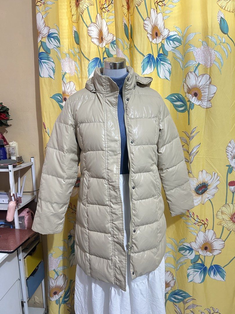 Beige winter jacket Puffer Jacket with Hood (Category: Coats, Jackets and Outerwear) located in Makati City. Submitted by aizy_sell (Listing ID 1465028435, Image 3). Description: Medium to semi large Location taguig city.