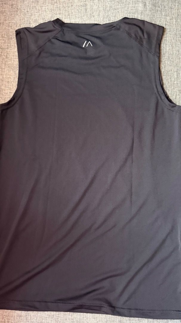 Bench Active Compression Tank Top | L | Black (Category: Activewear) located in Cainta. Submitted by goodstuffxiv (Listing ID 1465018297, Image 2). Description: - Brand/Model: Bench Active Compression Tank Top - Color: Black - Size: L - Material: 87% polyester, 13% elastan - Design: Crew neck, sleeveless, side panel stitching, and logo print near the back collar - Features: Breathable fabric with UPF 140 sun protection rating - Used less than 3 t